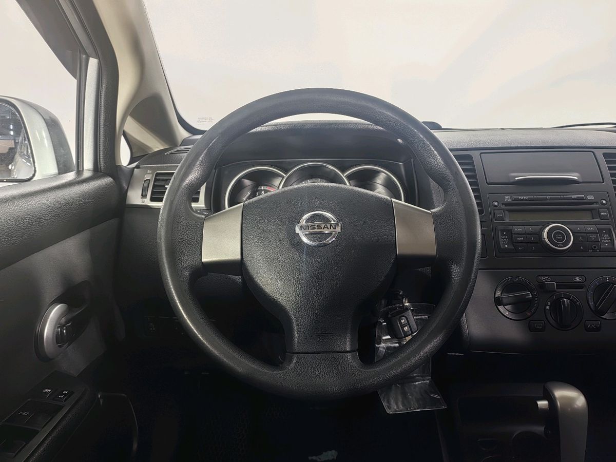 Nissan Tiida Elegance 2012 г.в., 256 461 км.
