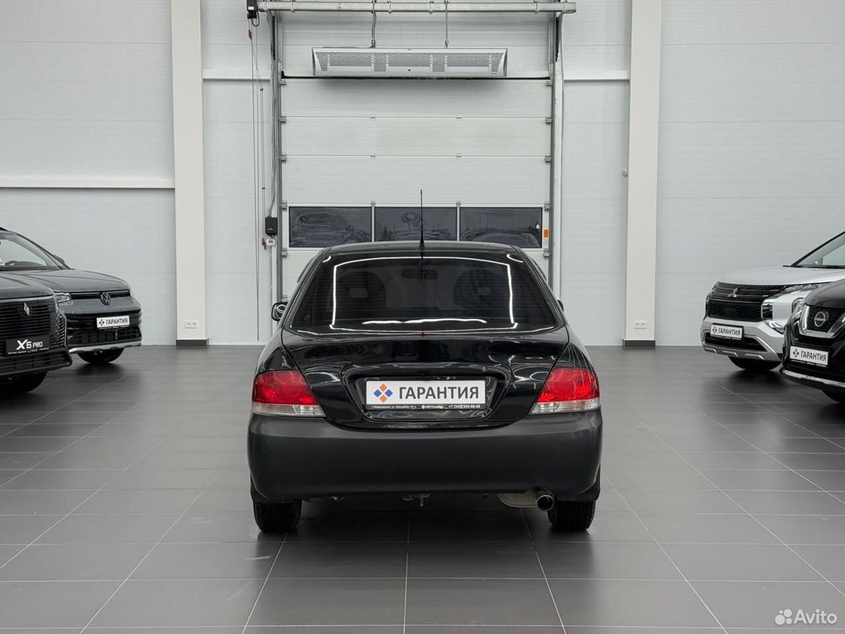 Mitsubishi Lancer 1.6 AT (98 л.с.) 2007 1.6 AT (98 л.с.) 2007 — фото 3