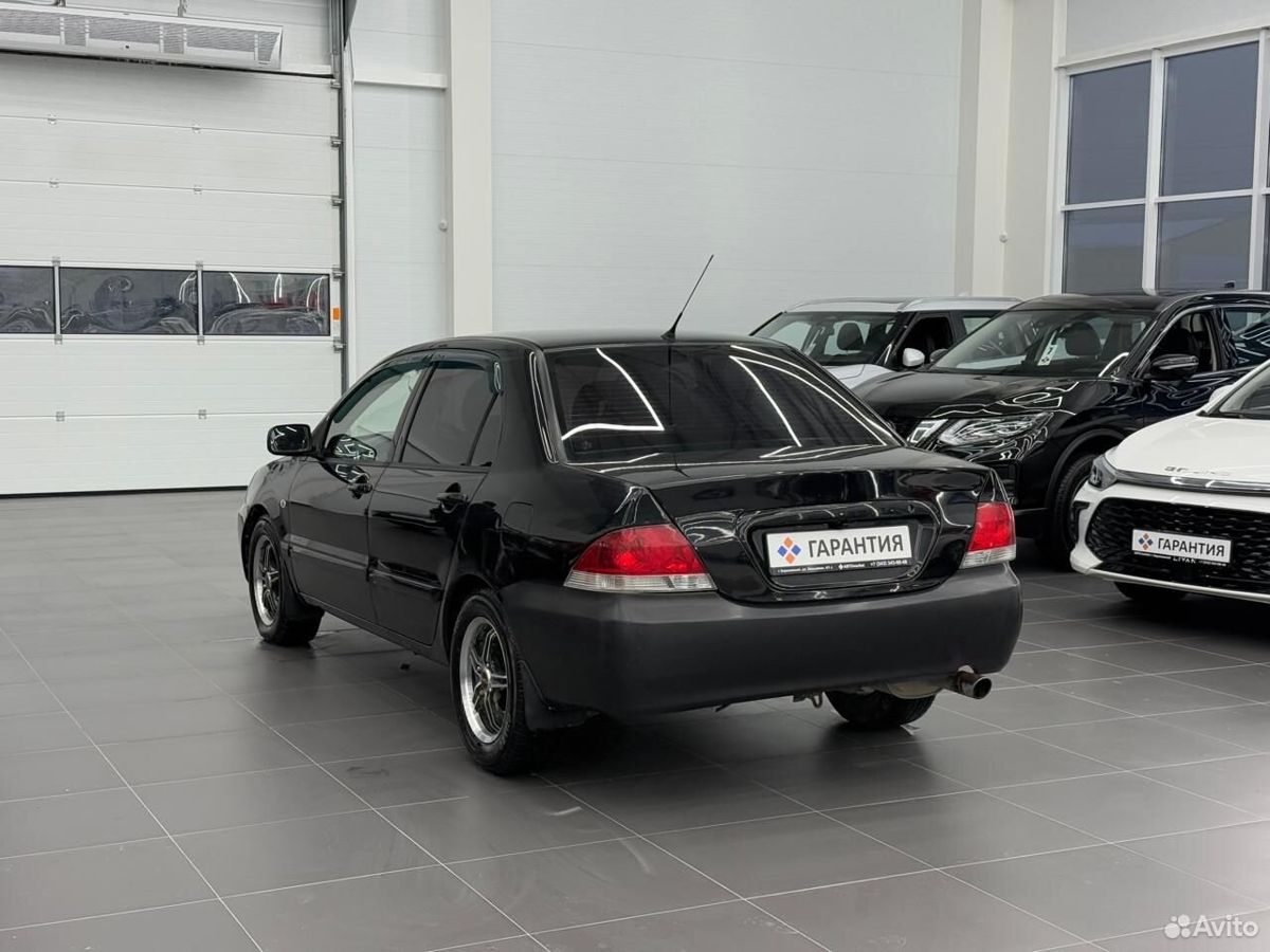 Mitsubishi Lancer 1.6 AT (98 л.с.) 2007 1.6 AT (98 л.с.) 2007 — фото 2