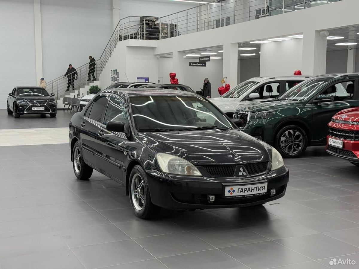Mitsubishi Lancer IX Рестайлинг 1.6 AT (98 л.с.) 2007