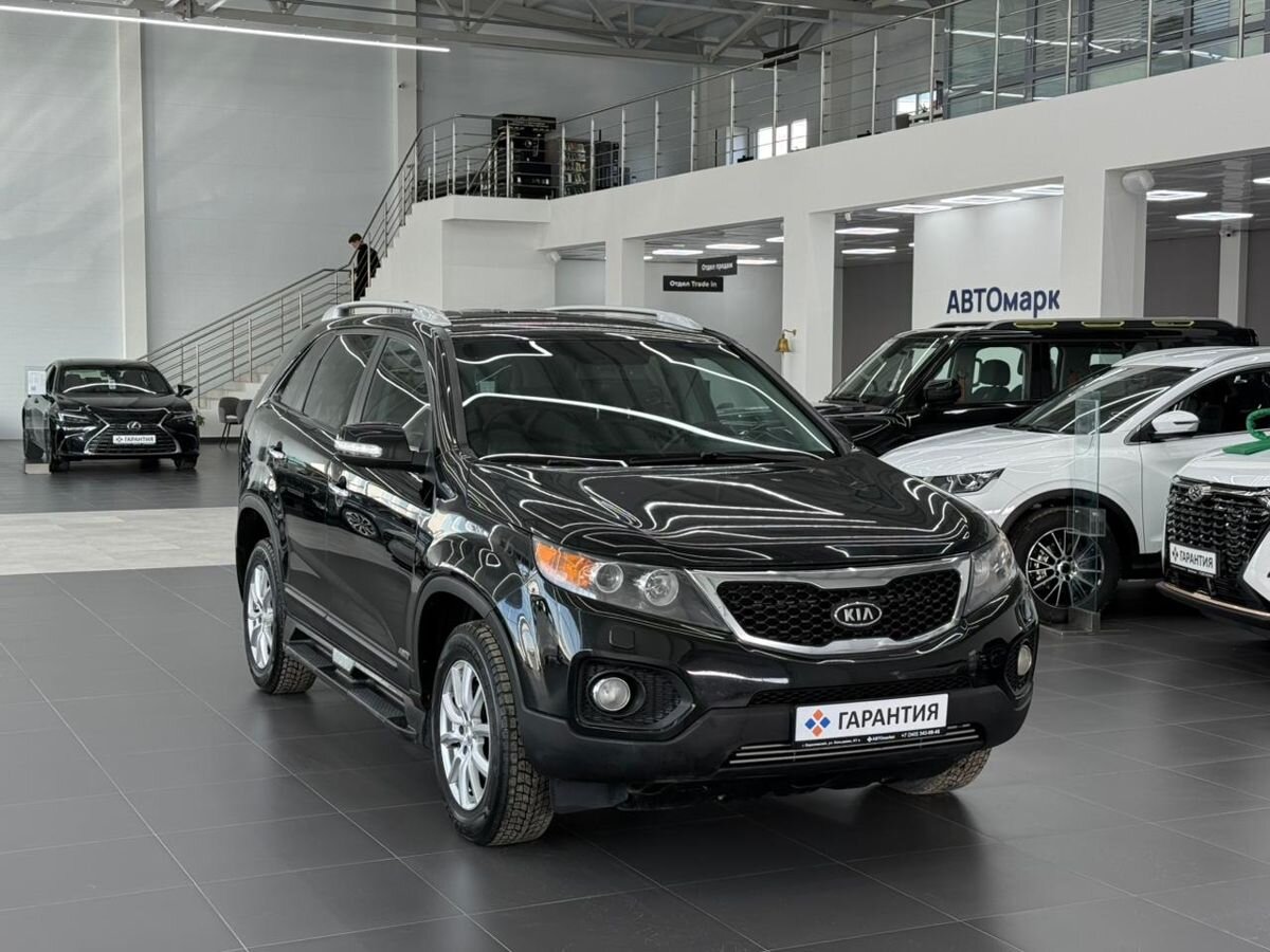 Kia Sorento II 2.4 AT (175 л.с.) 4WD 2009