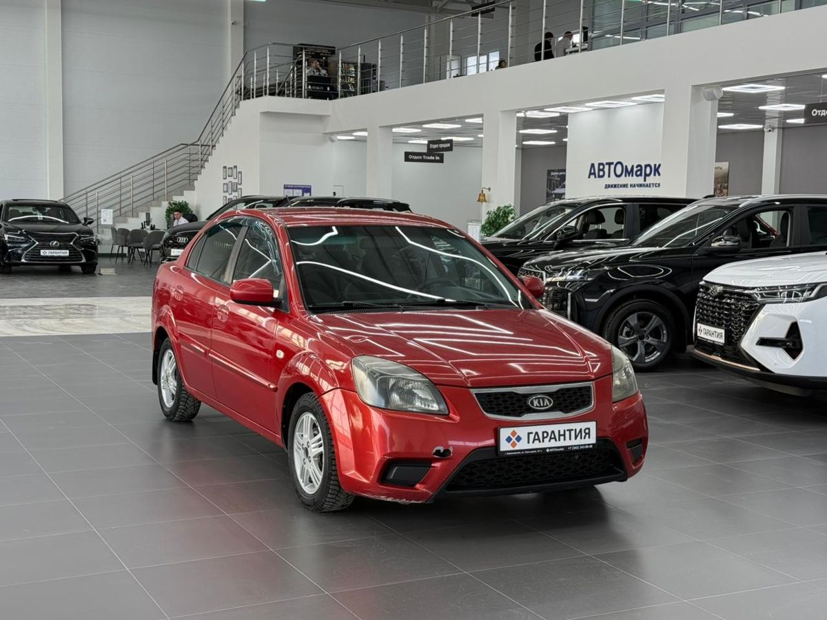 Kia Rio II Рестайлинг 1.4 MT (97 л.с.) Classic 2009