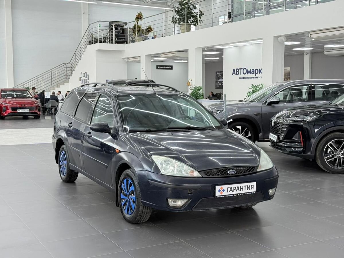 Ford Focus I Рестайлинг 1.6 MT (98 л.с.) 2005