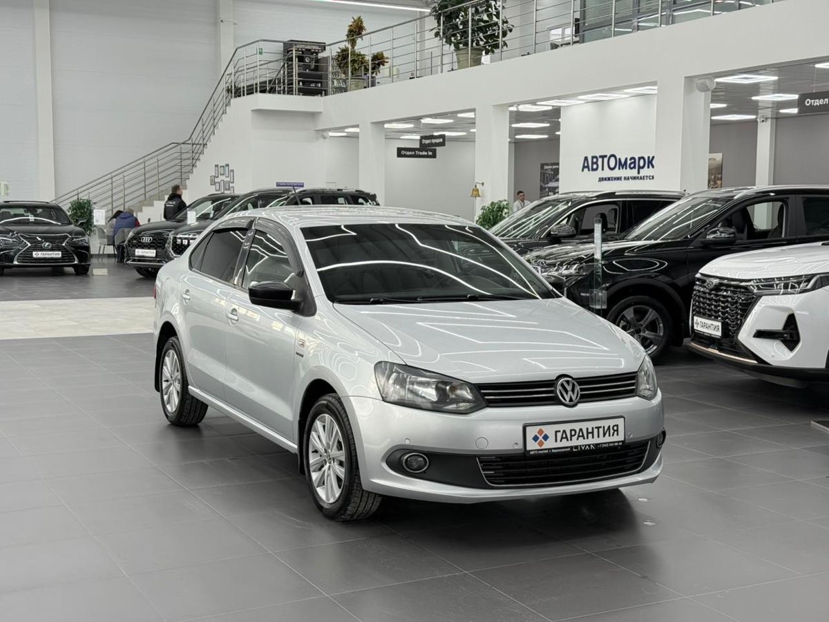 Volkswagen Polo V 1.6 MT (105 л.с.) 2013