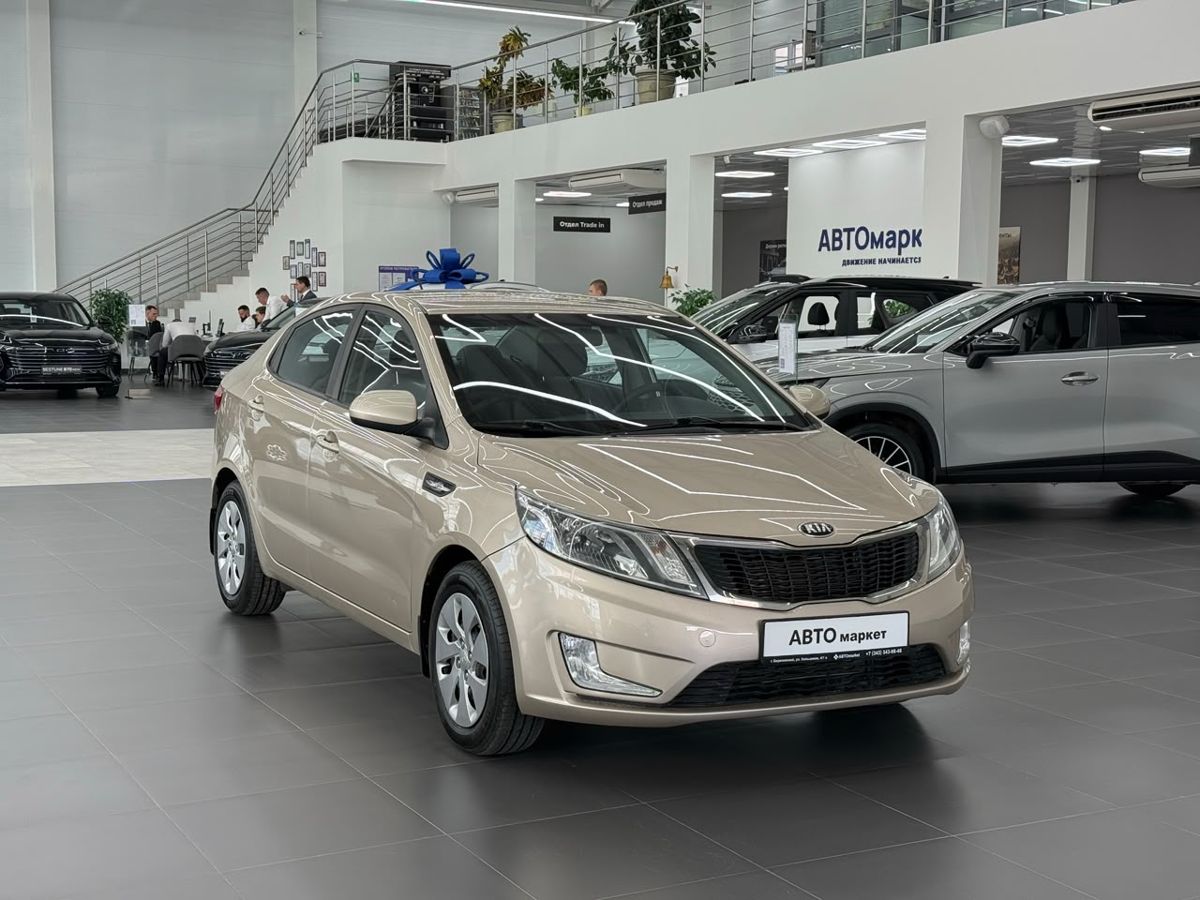 Kia Rio III 5-speed 1.6 MT (123 л.с.) Prestige 2013