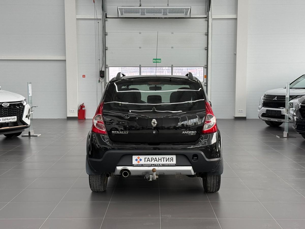Renault Sandero I Stepway 1.6 MT (84 л.с.) Stepway 2014 — фото 3