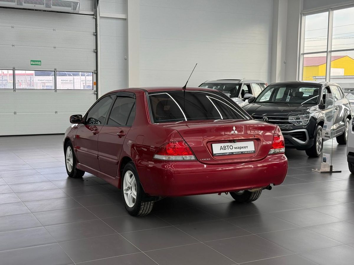 Mitsubishi Lancer IX 1.6 AT (98 л.с.) 2005 — фото 2