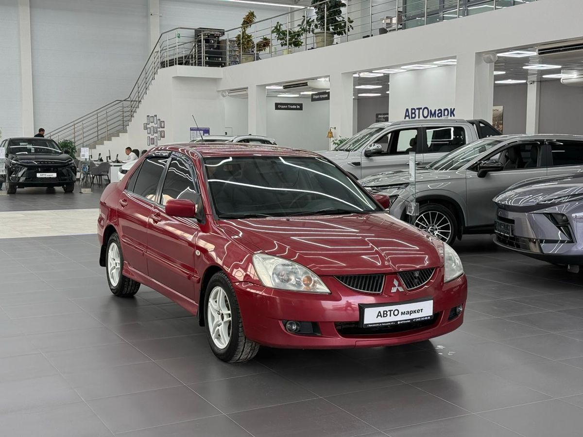 Mitsubishi Lancer IX 1.6 AT (98 л.с.) 2005