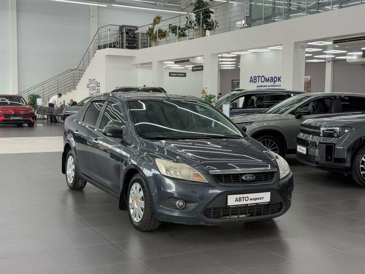 Ford Focus II Рестайлинг 1.8 MT (125 л.с.) Titanium 2008