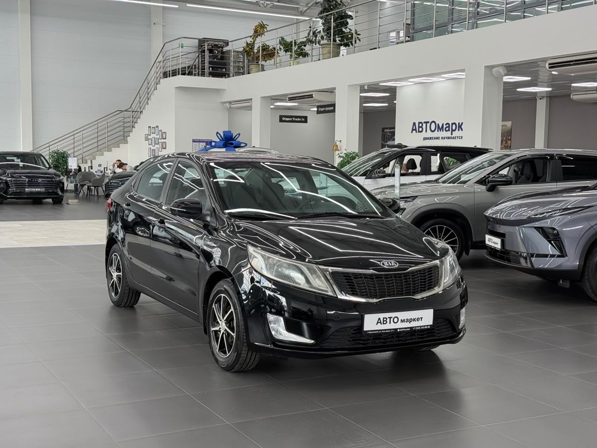 Kia Rio III 5-speed 1.6 MT (123 л.с.) 2012