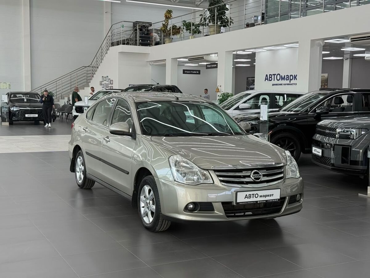 Nissan Almera III (G15) 1.6 MT (102 л.с.) 2013