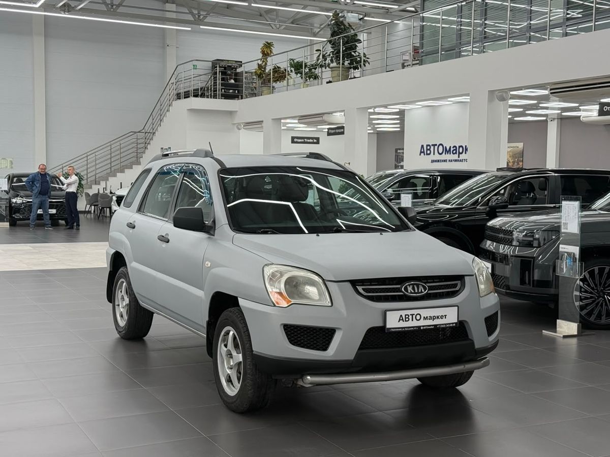 Kia Sportage II Рестайлинг 2.0 MT (141 л.с.) 2009