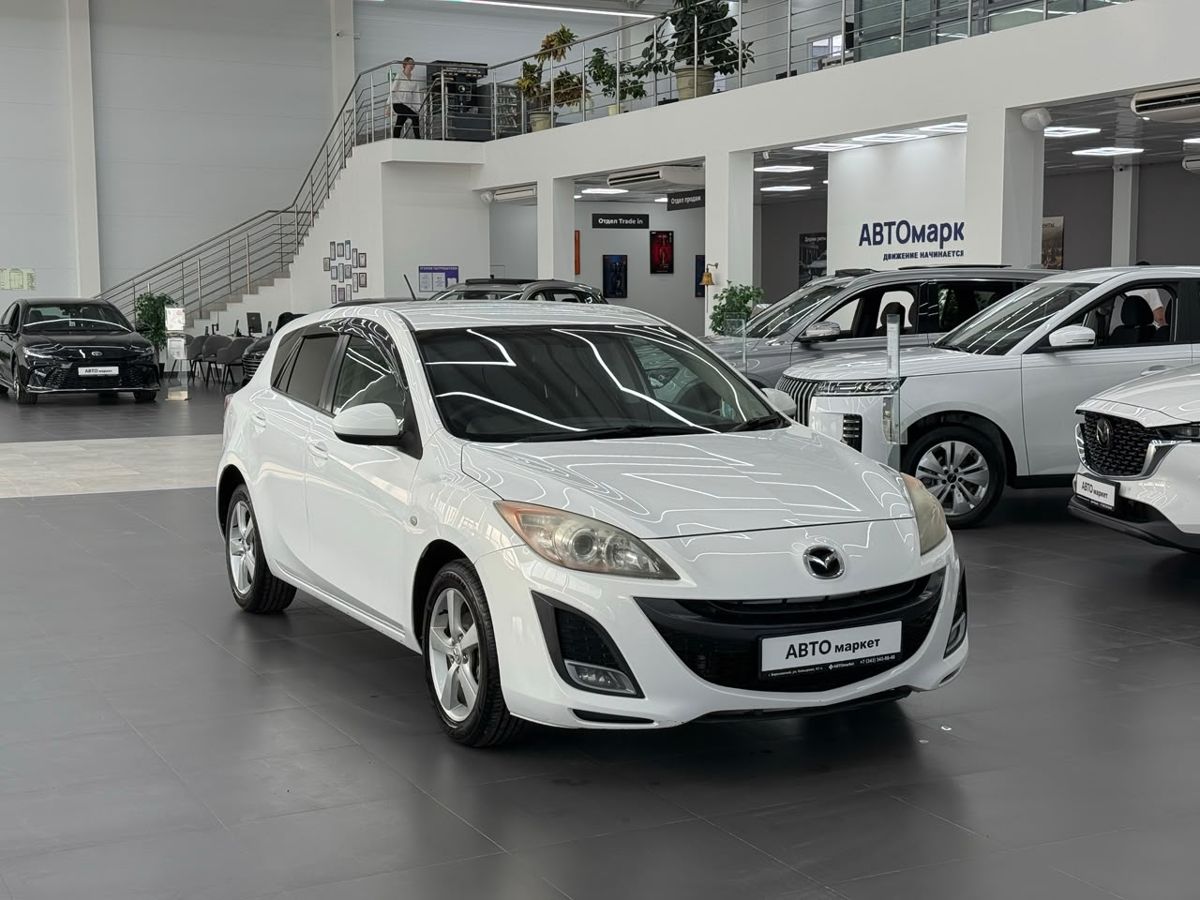 Mazda Axela II 1.5 CVT (111 л.с.) 2011