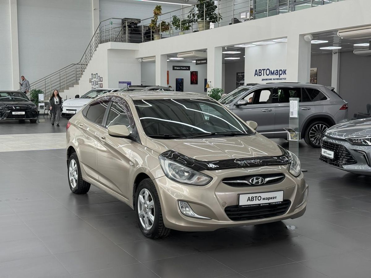 Hyundai Solaris I 1.4 MT (107 л.с.) Optima 2012