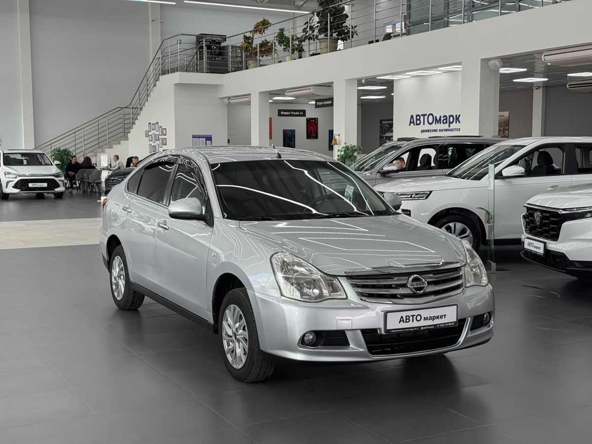 Nissan Almera III (G15) 1.6 MT (102 л.с.) 2014