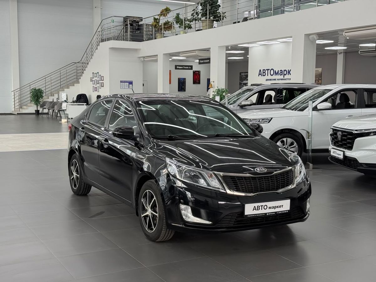 Kia Rio III 5-speed 1.6 MT (123 л.с.) 2012
