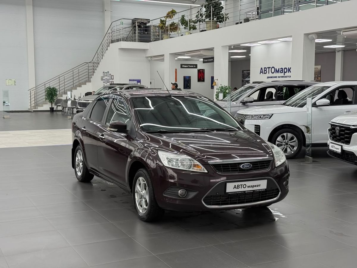 Ford Focus II Рестайлинг 1.6 AT (100 л.с.) 2010