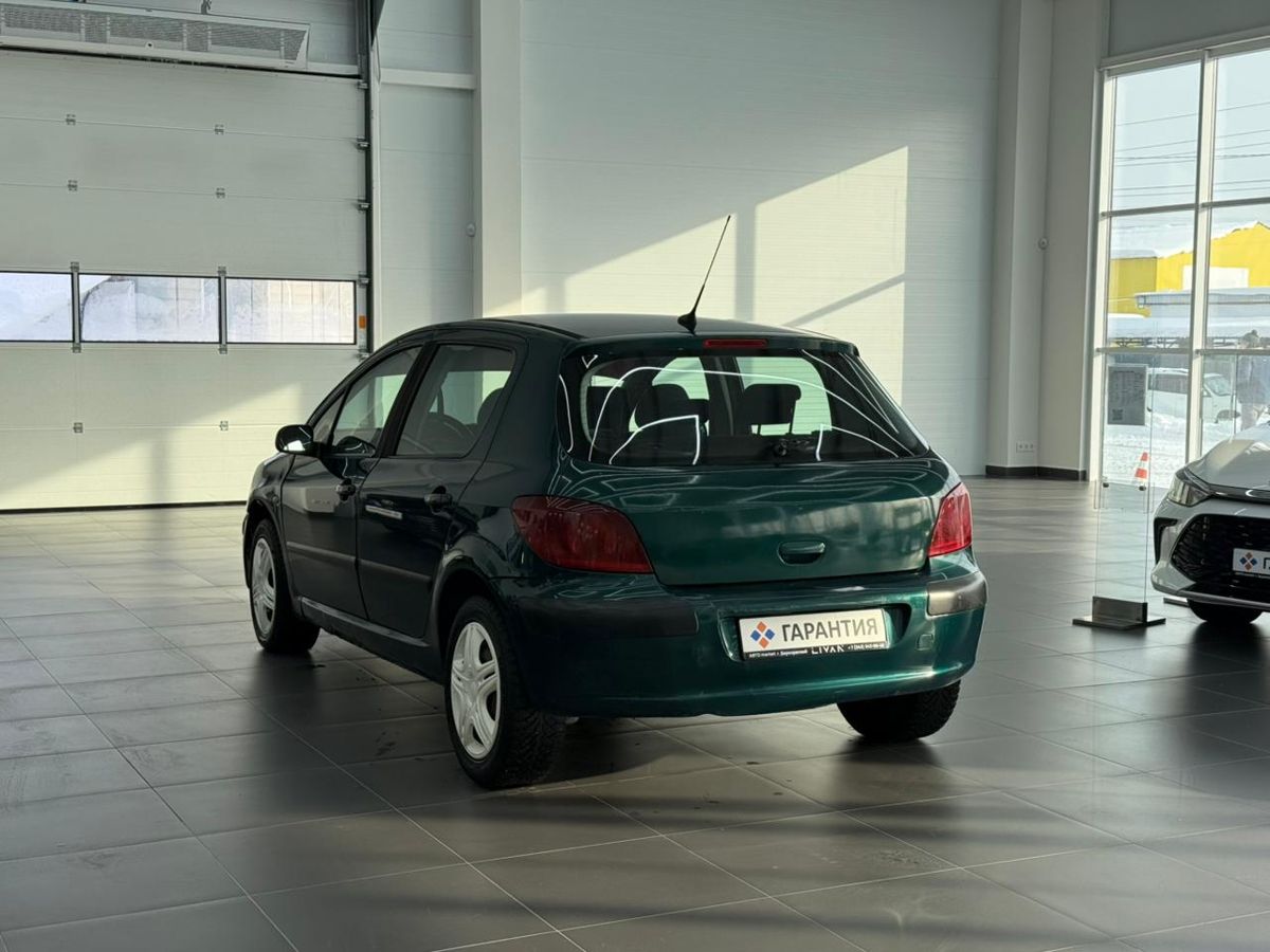 Peugeot 307 I 1.6 MT (109 л.с.) 2002 — фото 2