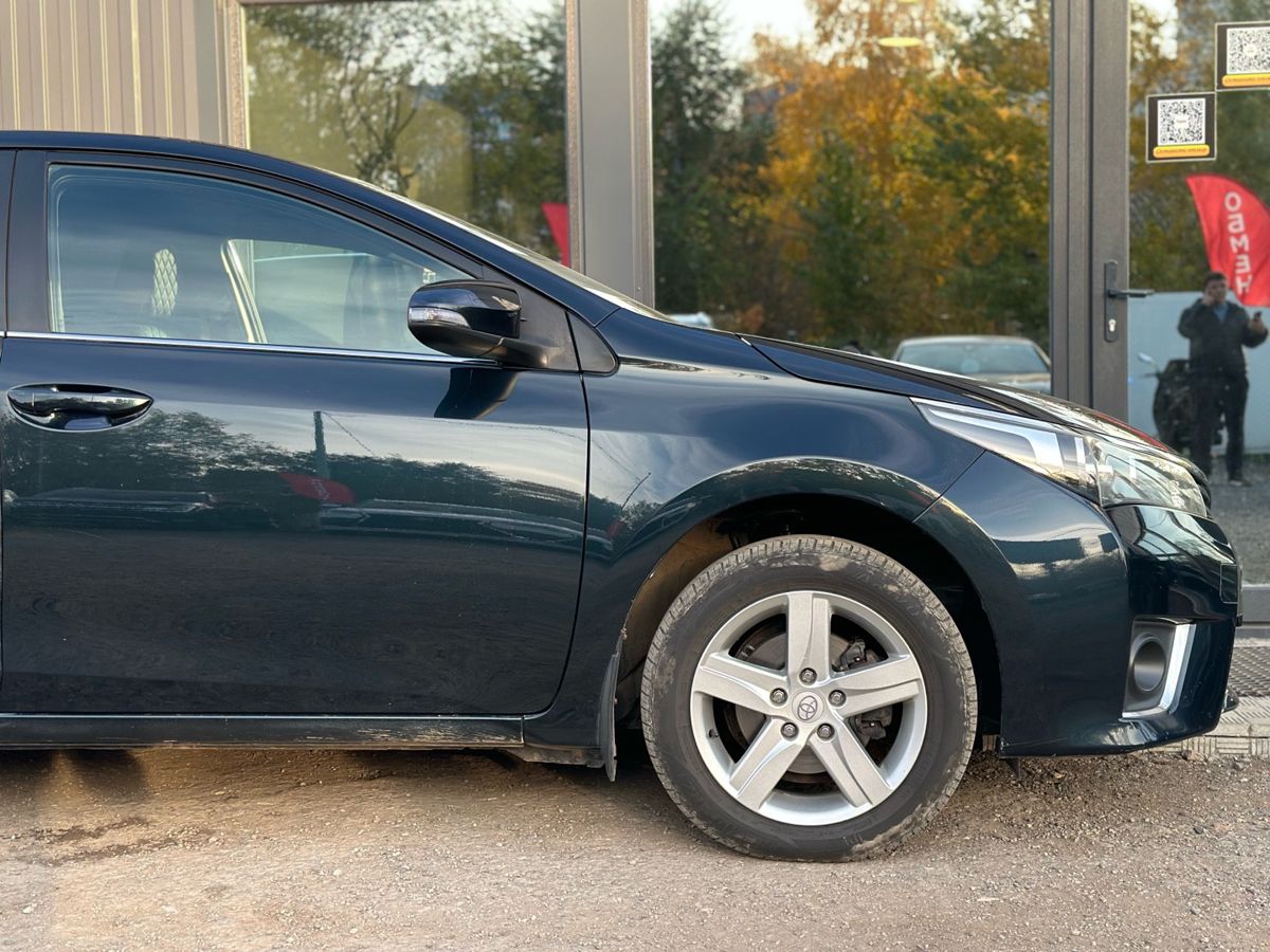 Toyota Corolla XI (E160, E170, E180) 1.6 CVT (122 л.с.) Стиль 2013 — фото 4