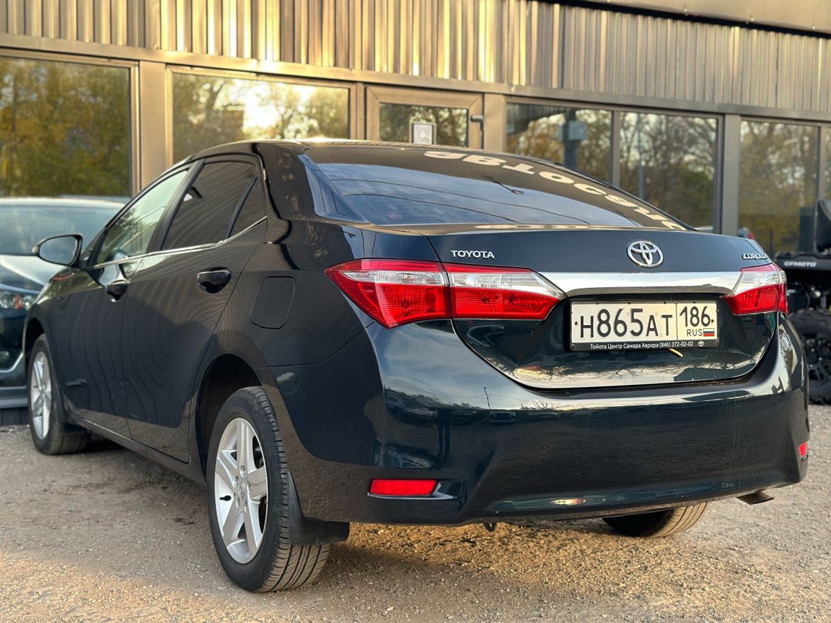 Toyota Corolla XI (E160, E170, E180) 1.6 CVT (122 л.с.) Стиль 2013 — фото 10