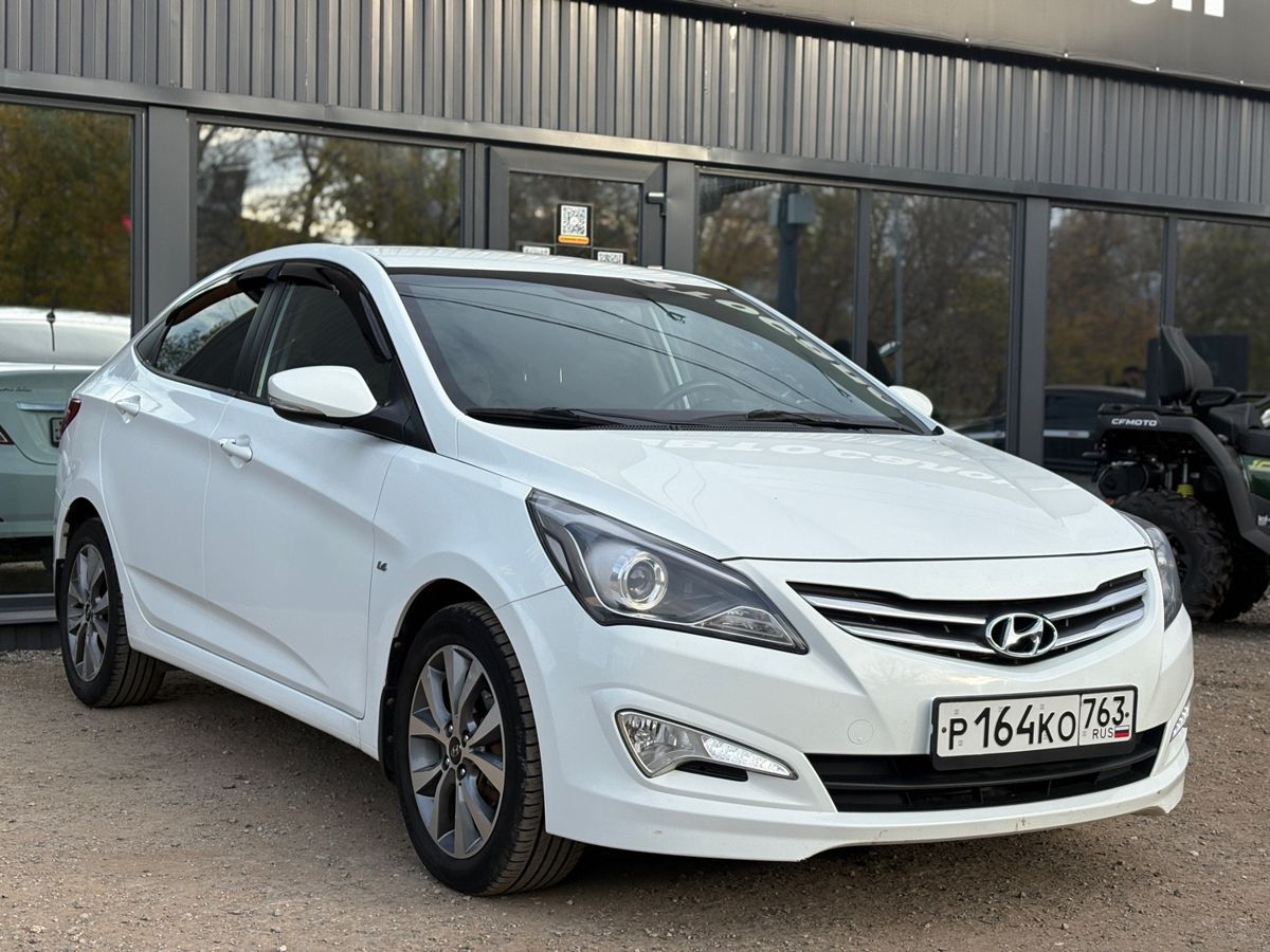 Hyundai Solaris I Рестайлинг 1.6 AT (123 л.с.) Elegance 2014 — фото 1