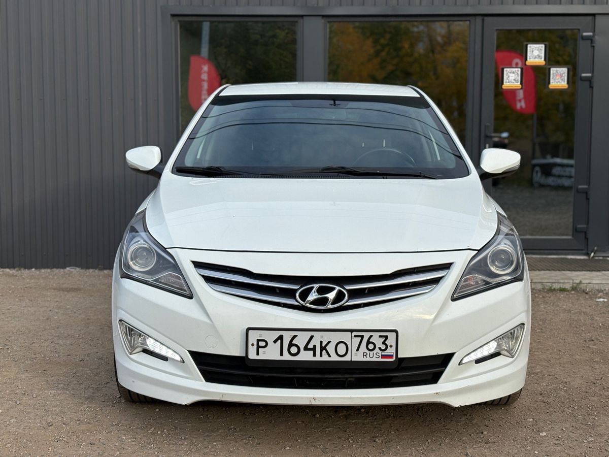 Hyundai Solaris I Рестайлинг 1.6 AT (123 л.с.) Elegance 2014 — фото 2