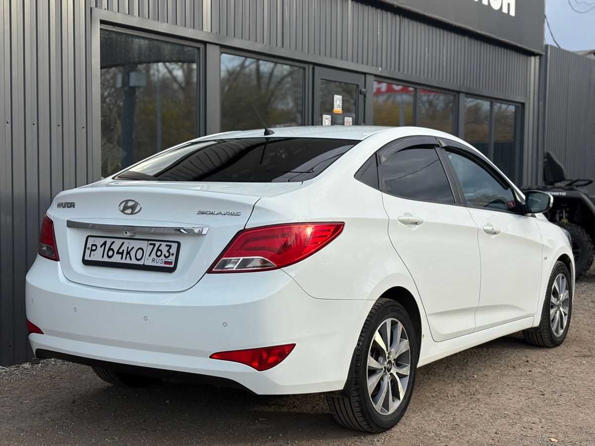 Hyundai Solaris I Рестайлинг 1.6 AT (123 л.с.) Elegance 2014 — фото 6