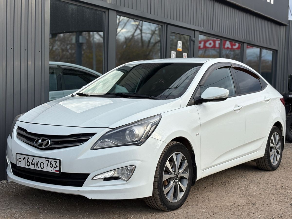 Hyundai Solaris I Рестайлинг 1.6 AT (123 л.с.) Elegance 2014 — фото 10