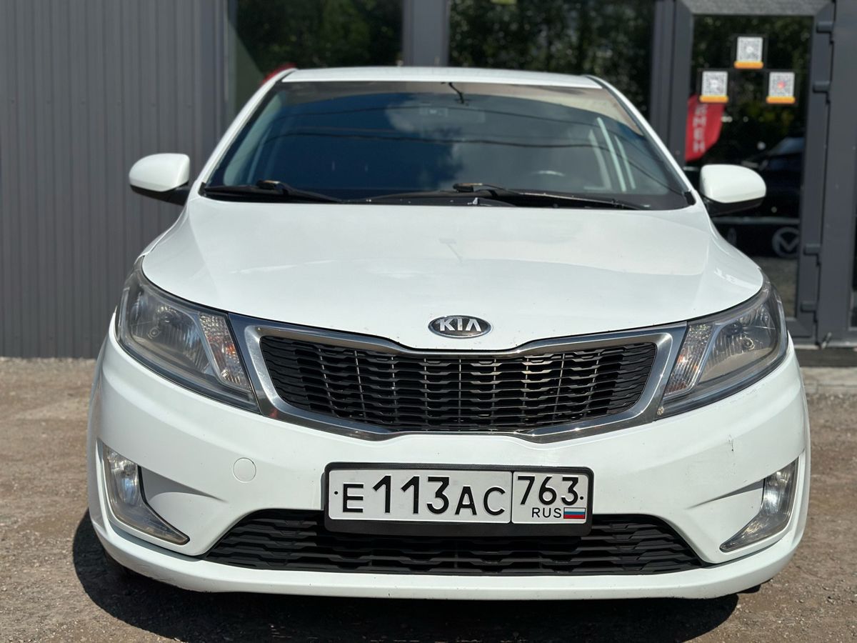 Kia Rio III 1.4 MT (107 л.с.) Comfort 2013 — фото 2