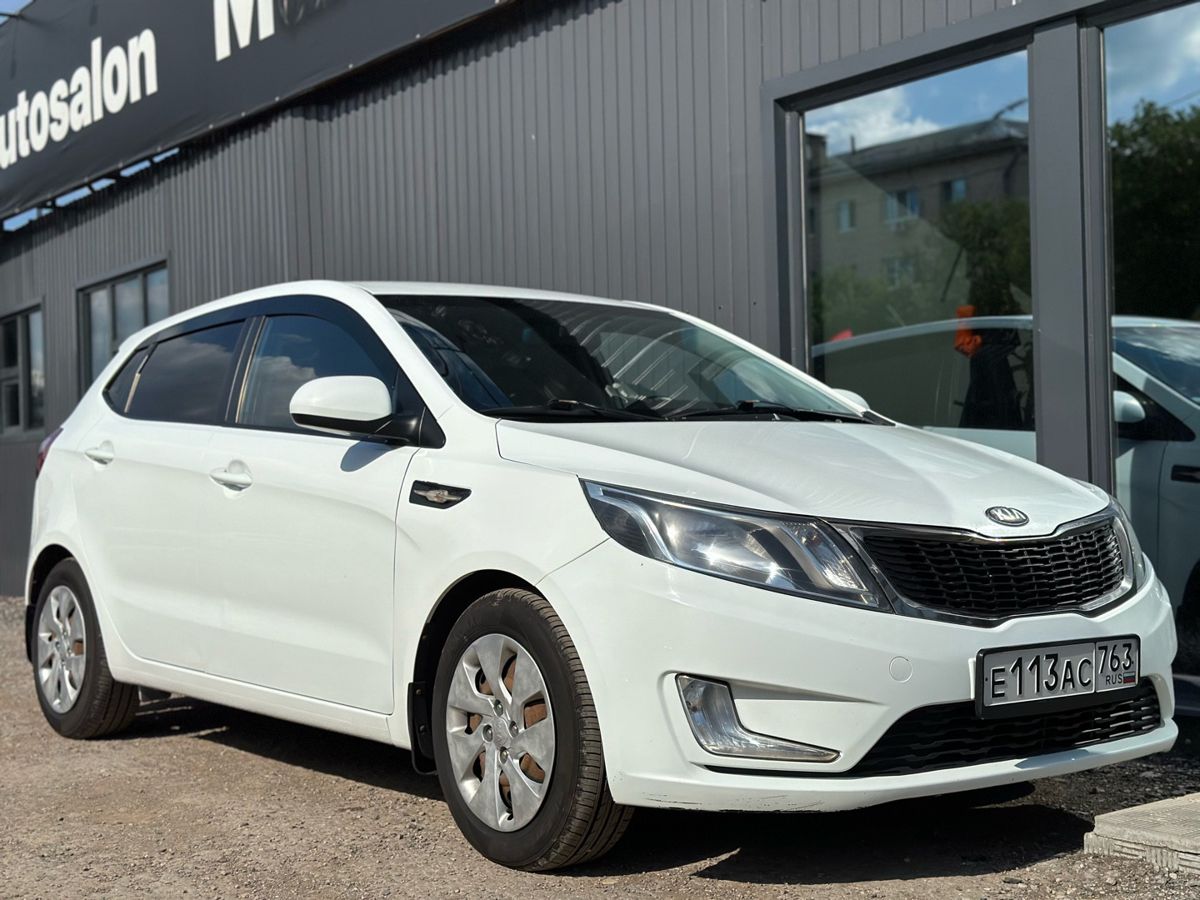 Kia Rio III 1.4 MT (107 л.с.) Comfort 2013 — фото 7