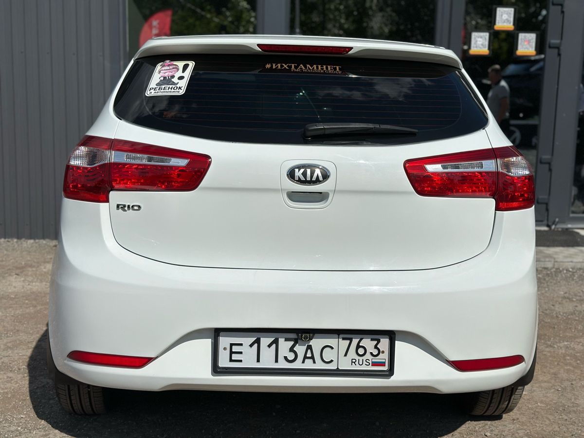Kia Rio III 1.4 MT (107 л.с.) Comfort 2013 — фото 10
