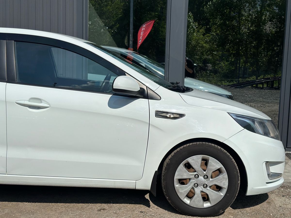 Kia Rio III 1.4 MT (107 л.с.) Comfort 2013 — фото 5