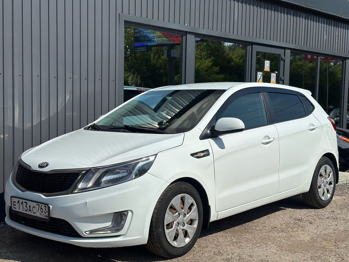 Kia Rio III 1.4 MT (107 л.с.) Comfort 2013 — фото 6
