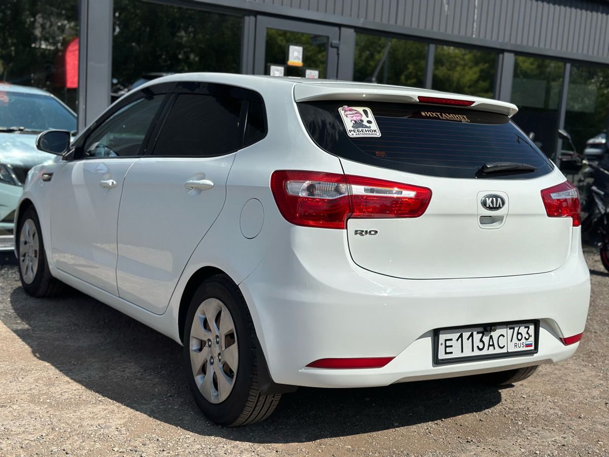 Kia Rio III 1.4 MT (107 л.с.) Comfort 2013 — фото 9