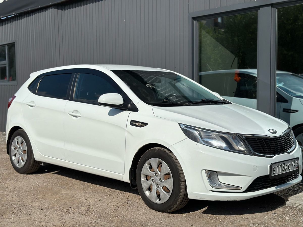 Kia Rio III 1.4 MT (107 л.с.) Comfort 2013 — фото 8