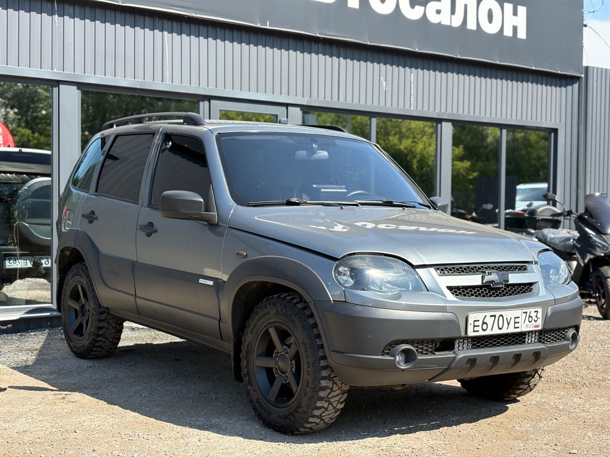 Chevrolet Niva I Рестайлинг 1.7 MT (80 л.с.) 4WD GL 2012 — фото 1