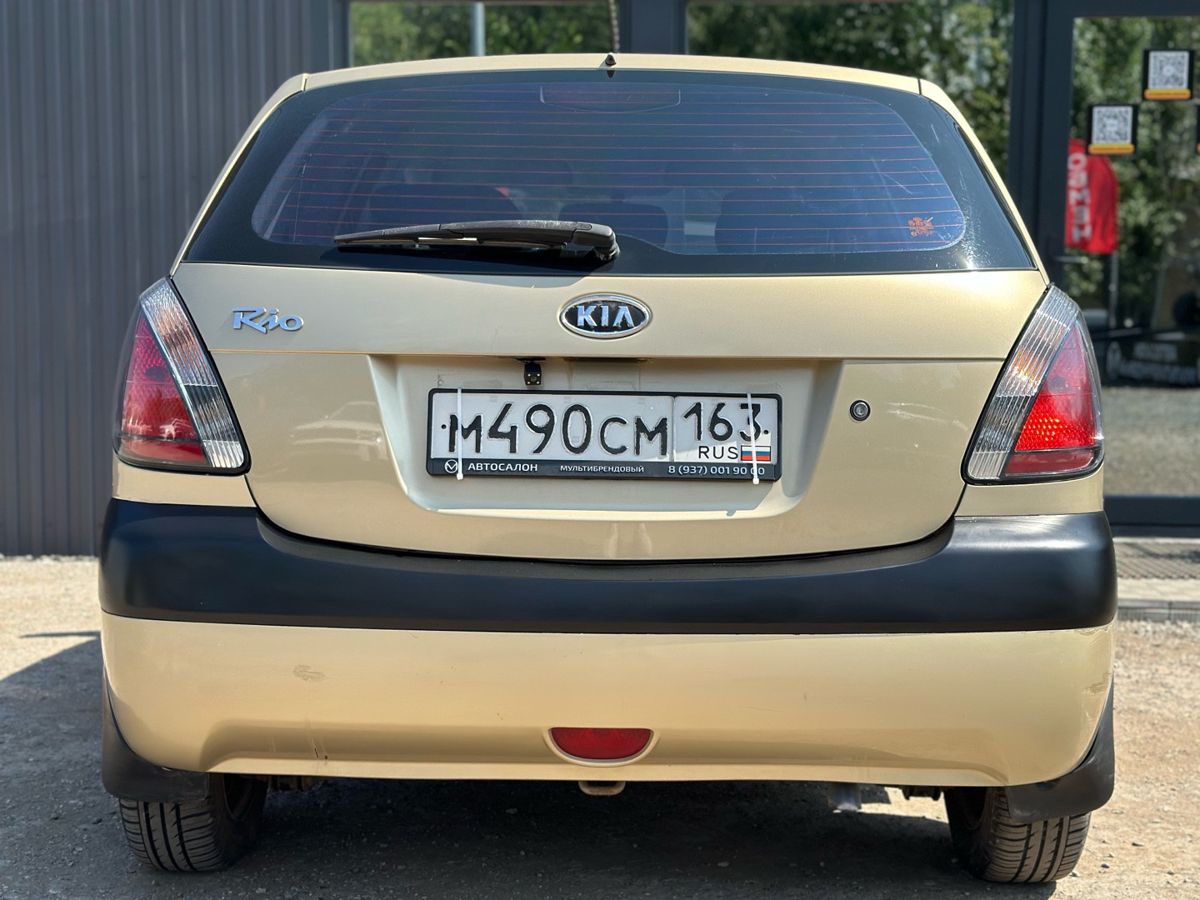 Kia Rio II 1.4 MT (97 л.с.) Люкс 2009 — фото 10