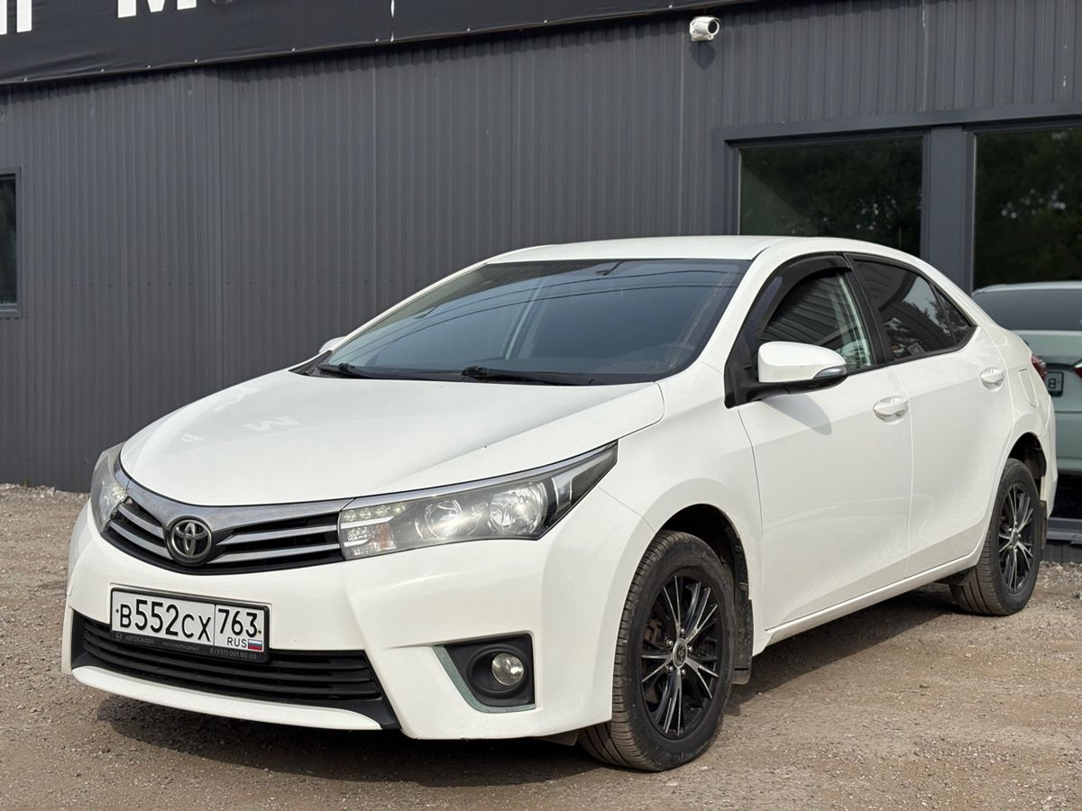 Toyota Corolla XI (E160, E170, E180) 1.6 CVT (122 л.с.) Стиль Плюс 2014 — фото 3