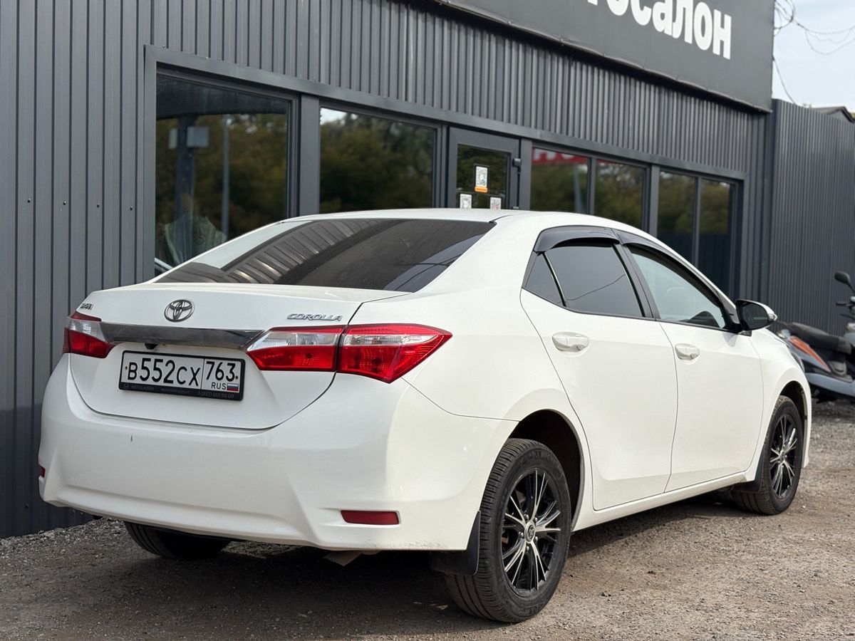 Toyota Corolla XI (E160, E170, E180) 1.6 CVT (122 л.с.) Стиль Плюс 2014 — фото 7