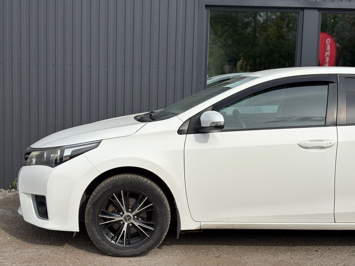 Toyota Corolla XI (E160, E170, E180) 1.6 CVT (122 л.с.) Стиль Плюс 2014 — фото 10