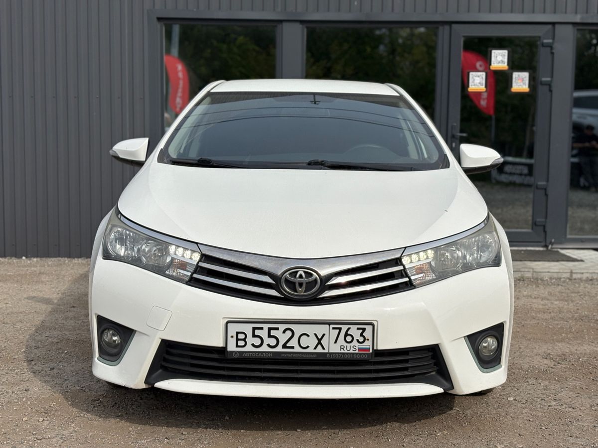 Toyota Corolla XI (E160, E170, E180) 1.6 CVT (122 л.с.) Стиль Плюс 2014 — фото 2