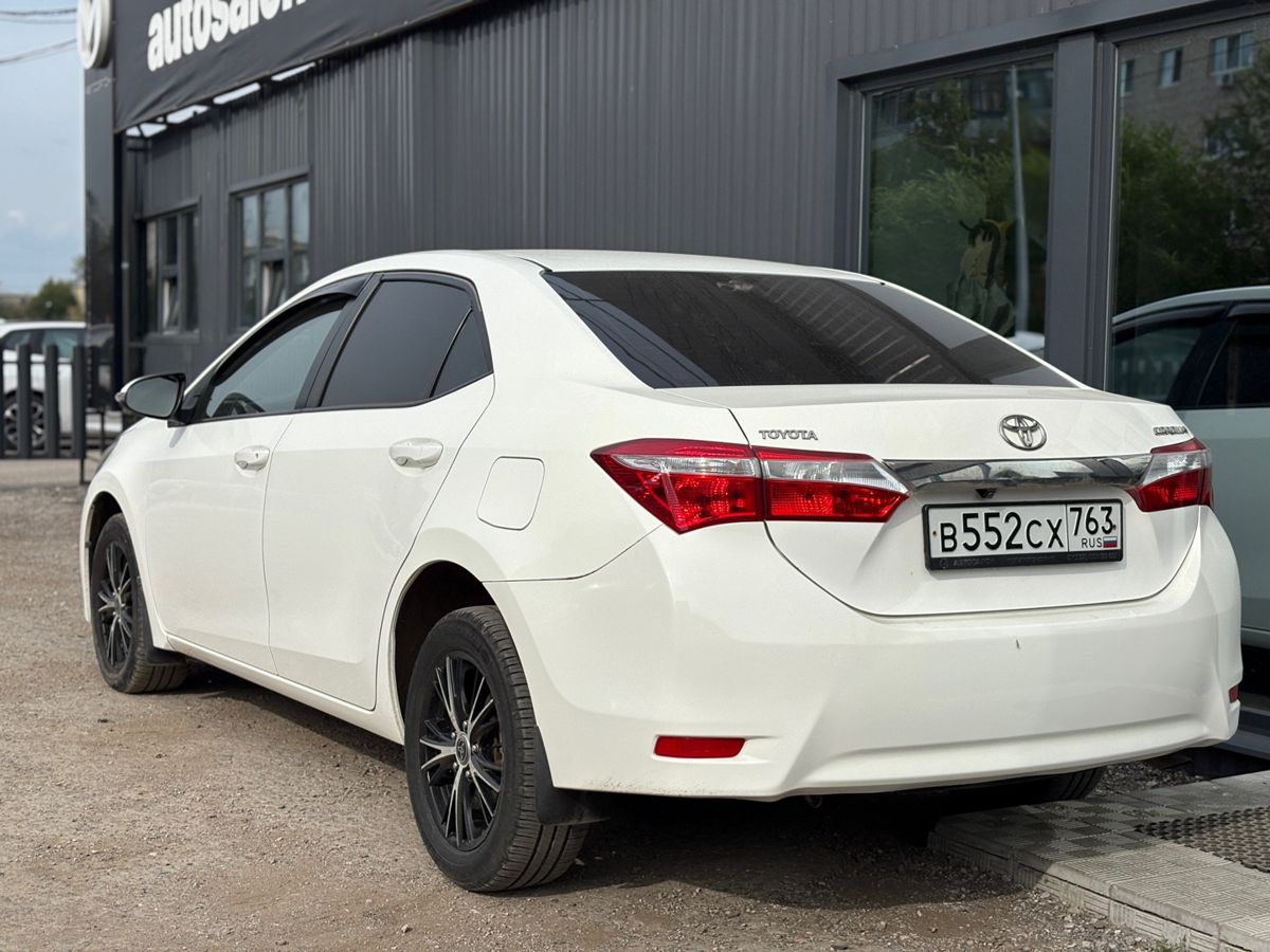 Toyota Corolla XI (E160, E170, E180) 1.6 CVT (122 л.с.) Стиль Плюс 2014 — фото 8