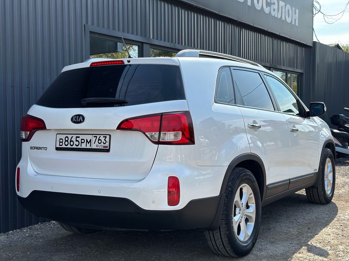 Kia Sorento II Рестайлинг 2.4 AT (175 л.с.) 4WD Luxe 2014 — фото 7