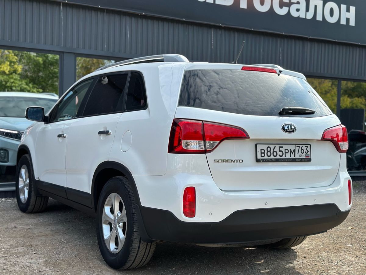 Kia Sorento II Рестайлинг 2.4 AT (175 л.с.) 4WD Luxe 2014 — фото 4