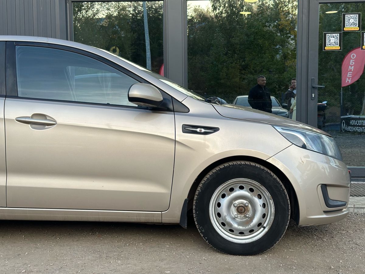 Kia Rio III 1.4 AT (107 л.с.) Comfort 2014 — фото 4