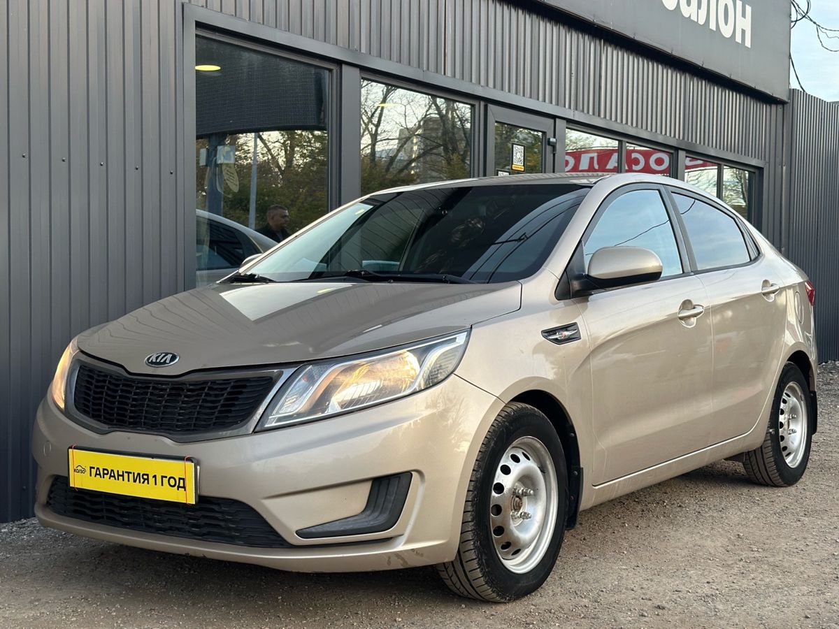 Kia Rio III 1.4 AT (107 л.с.) Comfort 2014 — фото 9