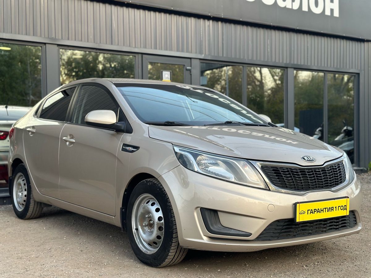 Kia Rio III 1.4 AT (107 л.с.) Comfort 2014 — фото 1