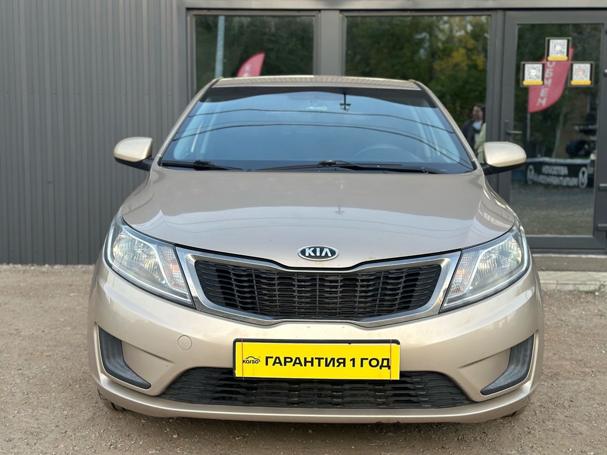 Kia Rio III 1.4 AT (107 л.с.) Comfort 2014 — фото 2