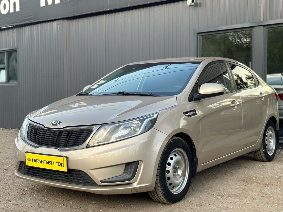 Kia Rio III 1.4 AT (107 л.с.) Comfort 2014 — фото 3