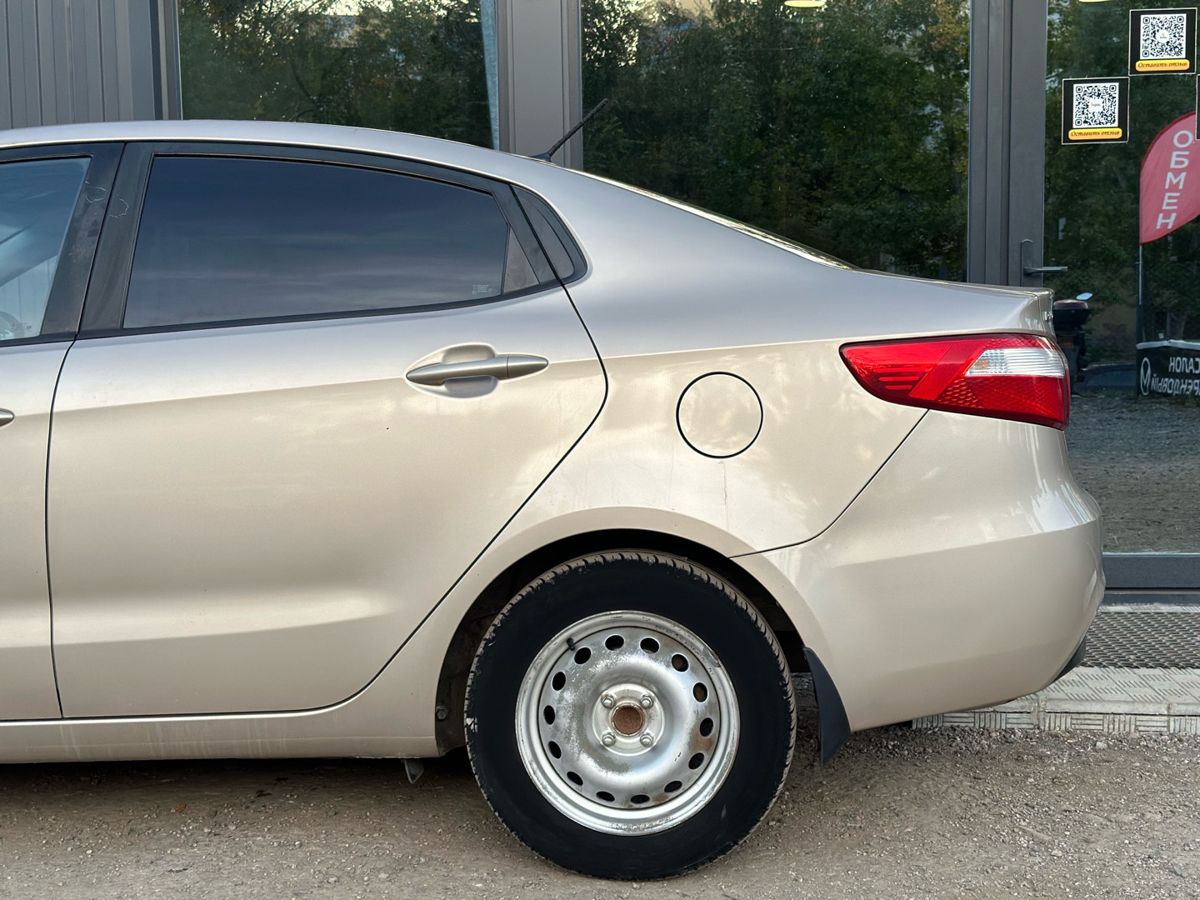 Kia Rio III 1.4 AT (107 л.с.) Comfort 2014 — фото 5